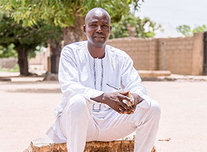 Man sitting outside in the sun