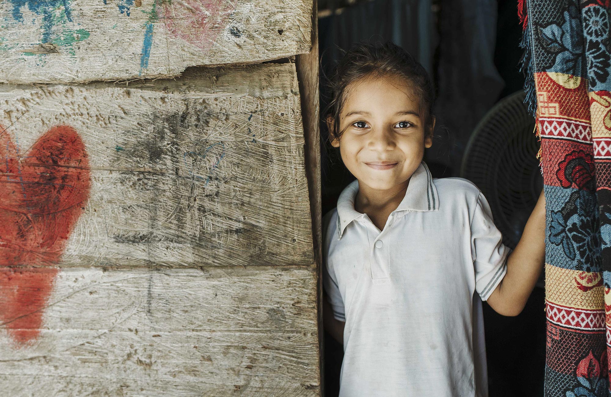 Girl smiling in doorway